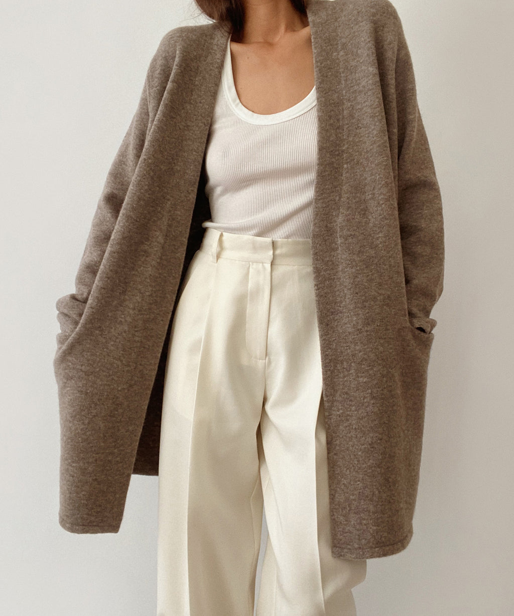 Manteau long à poches plaquées