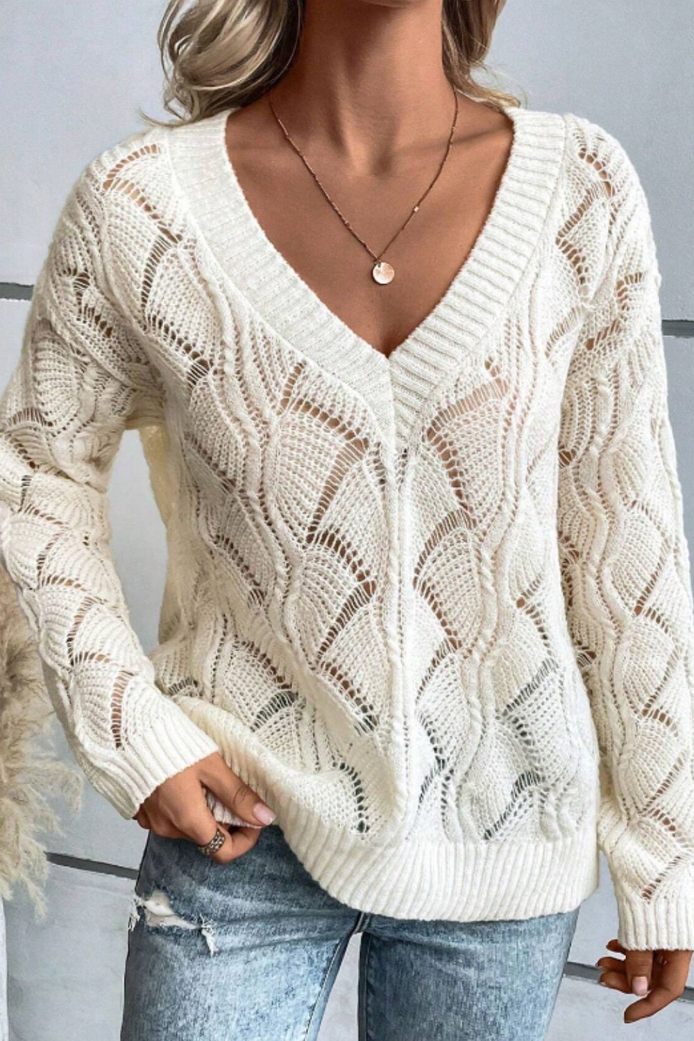 Sienna - Pull à col en V avec design ajouré et manches longues pour femme