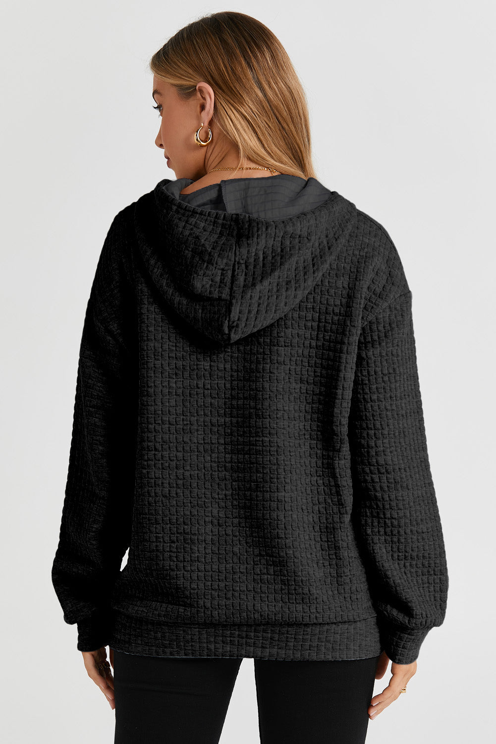 Sweat à capuche noir élégant avec motif matelassé et poche kangourou