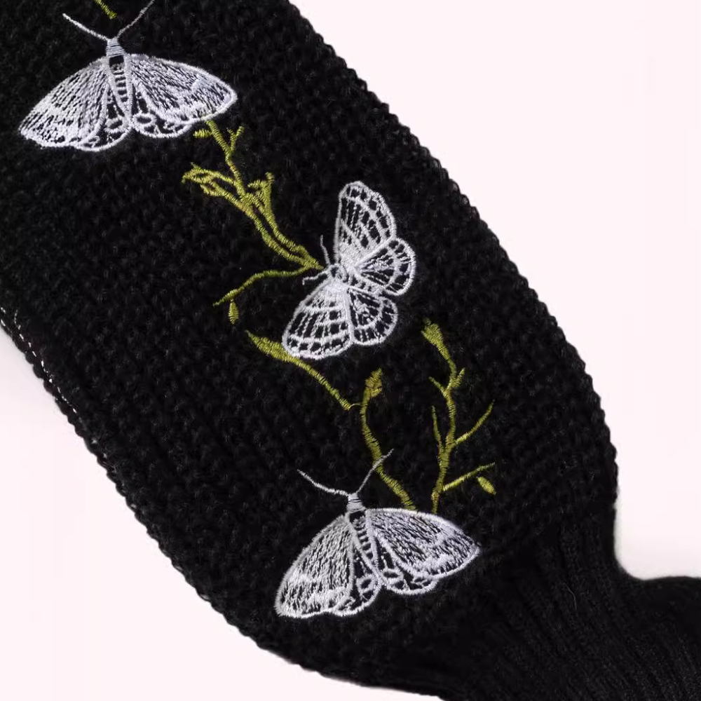 Zinaida - Chaud col roulé avec motif papillon délicat