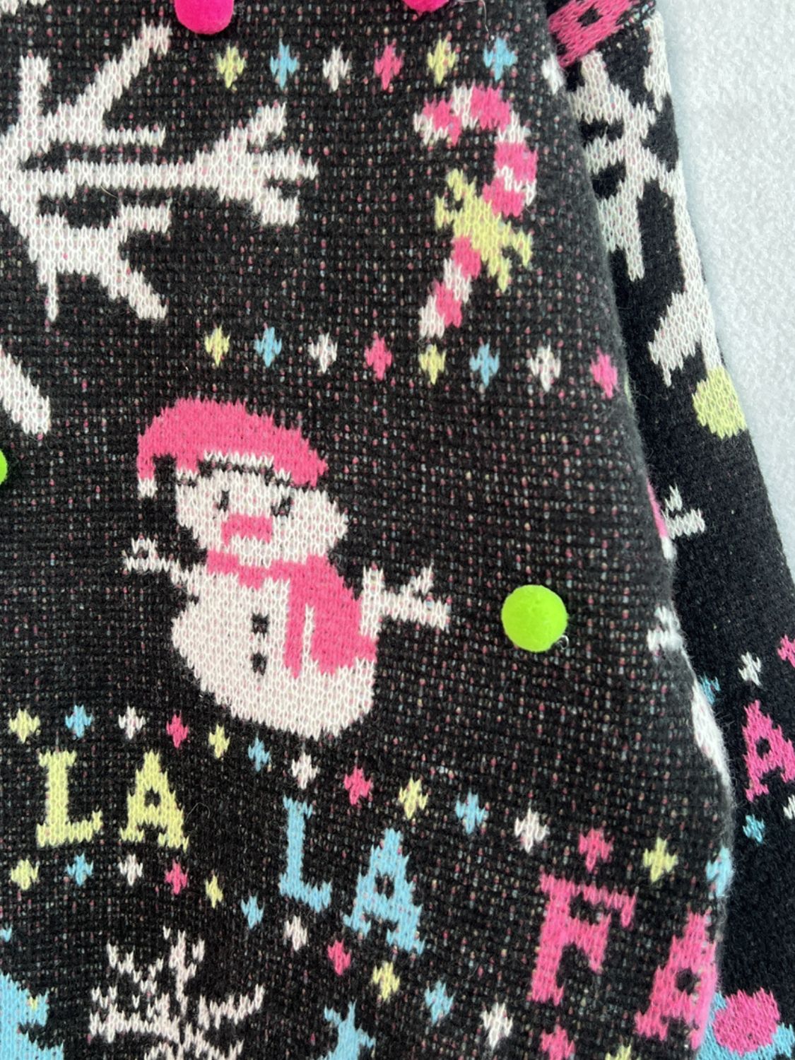Sierra - Noir Pull à col rond avec bordures contrastées et motif bonhomme de neige pour femme
