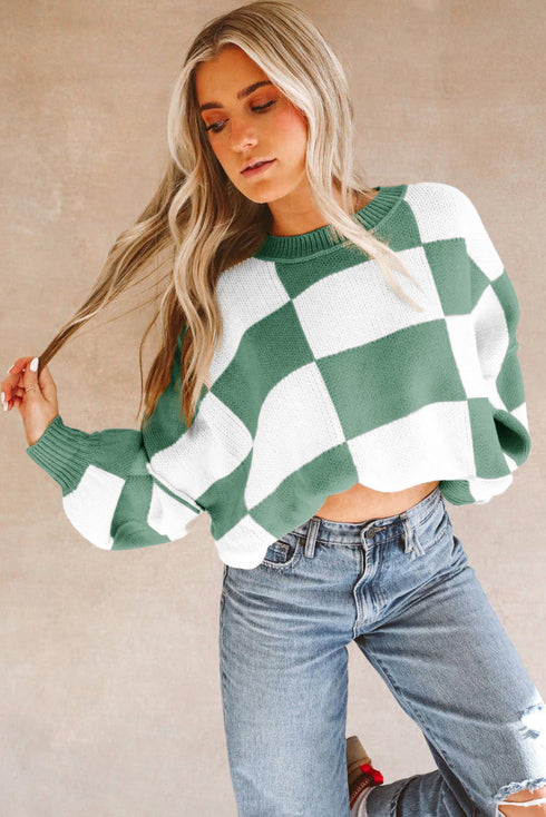 Pull à carreaux avec manches tendance : le style dans les détails
