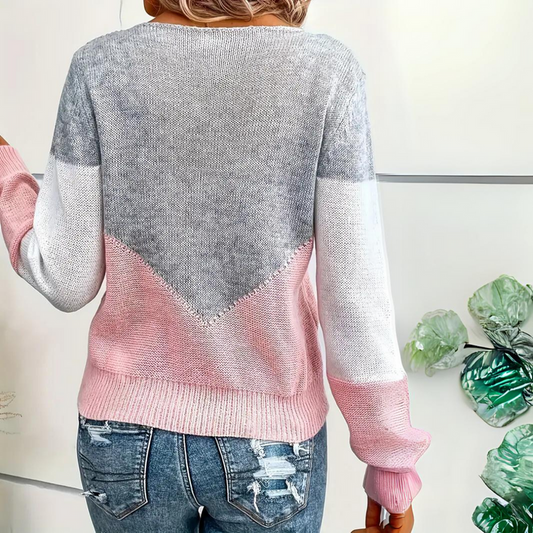 Pull élégant avec un motif expressif
