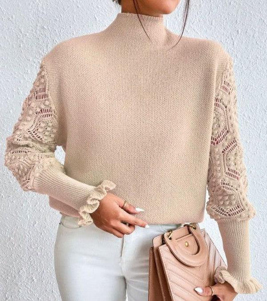 Pull abricot clair avec manches longues et motifs spectaculaires