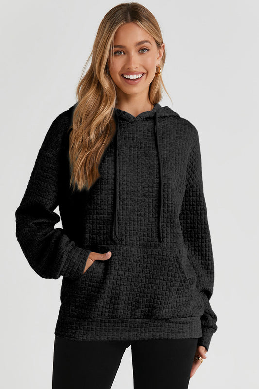 Sweat à capuche noir élégant avec motif matelassé et poche kangourou