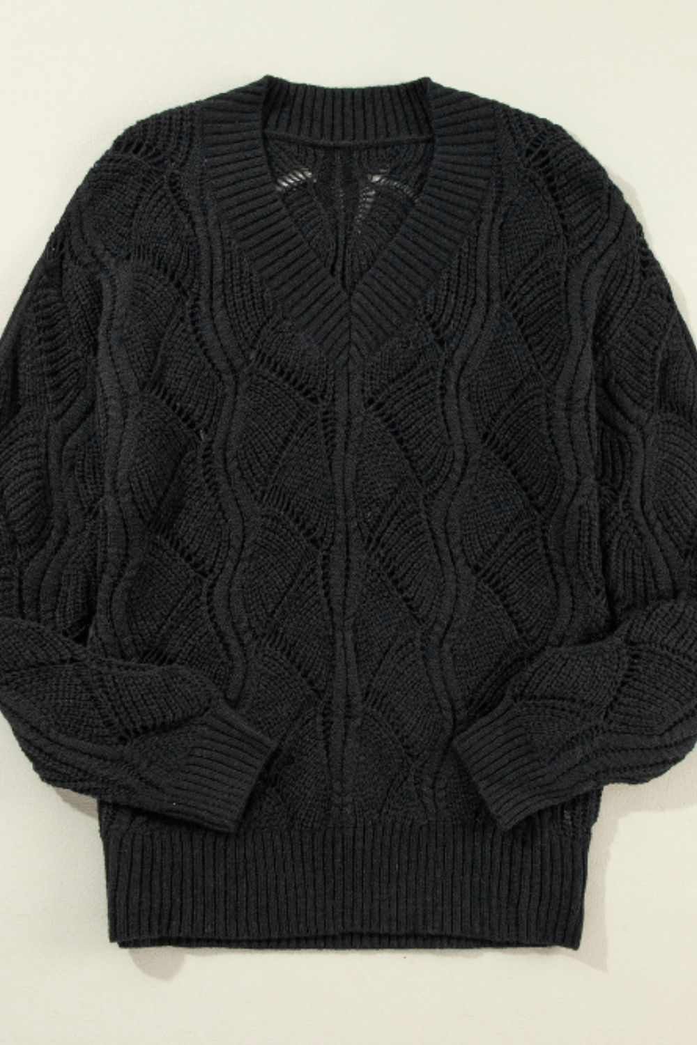 Sienna - Pull à col en V avec design ajouré et manches longues pour femme
