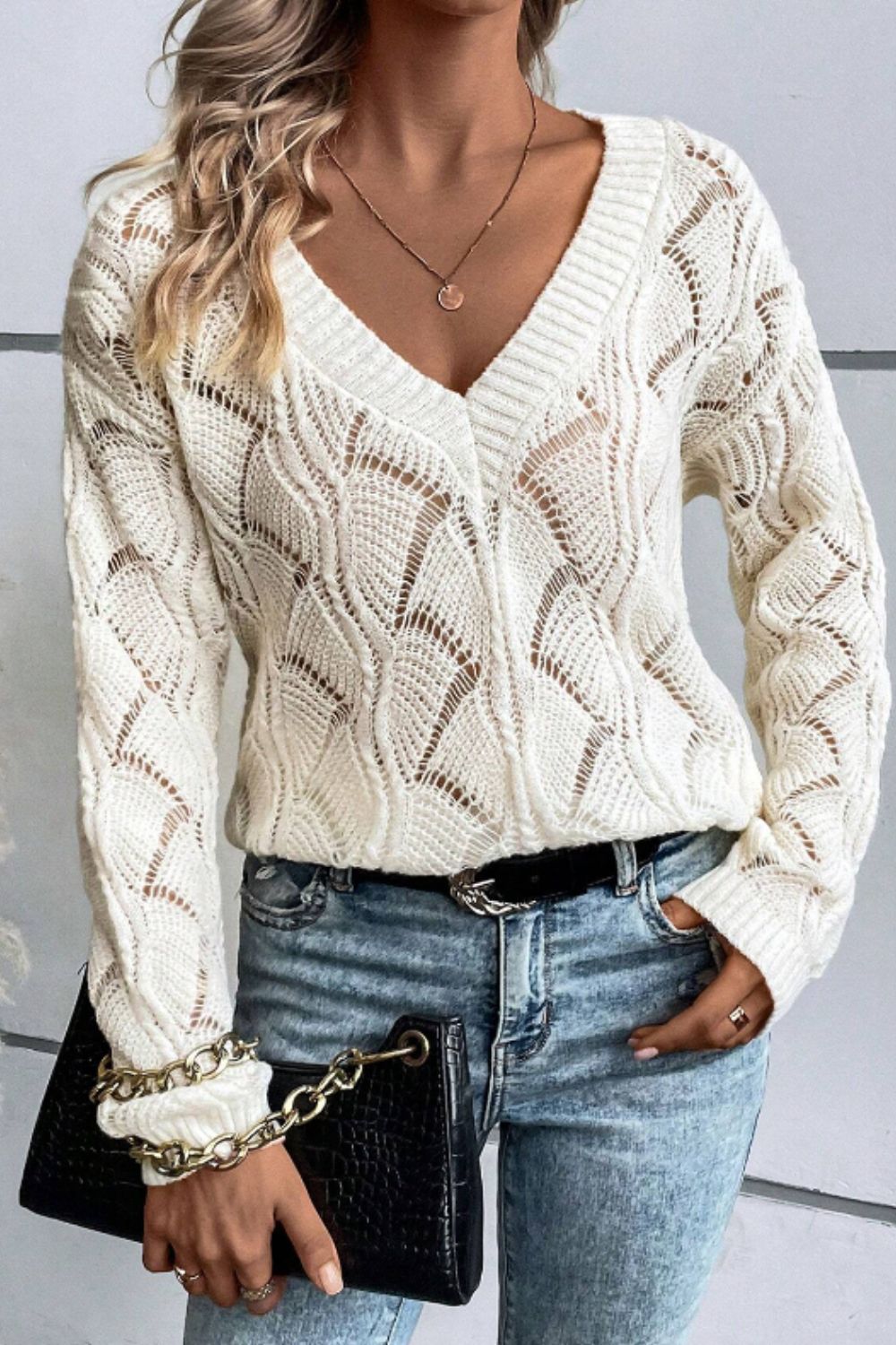 Sienna - Pull à col en V avec design ajouré et manches longues pour femme