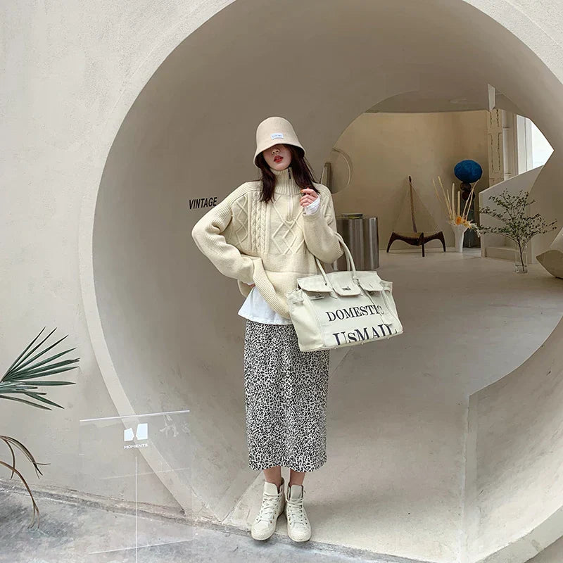 Hanna - Pull à col roulé avec torsades géométriques