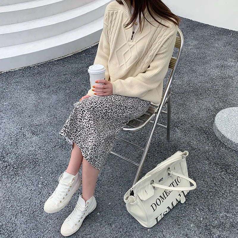 Hanna - Pull à col roulé avec torsades géométriques