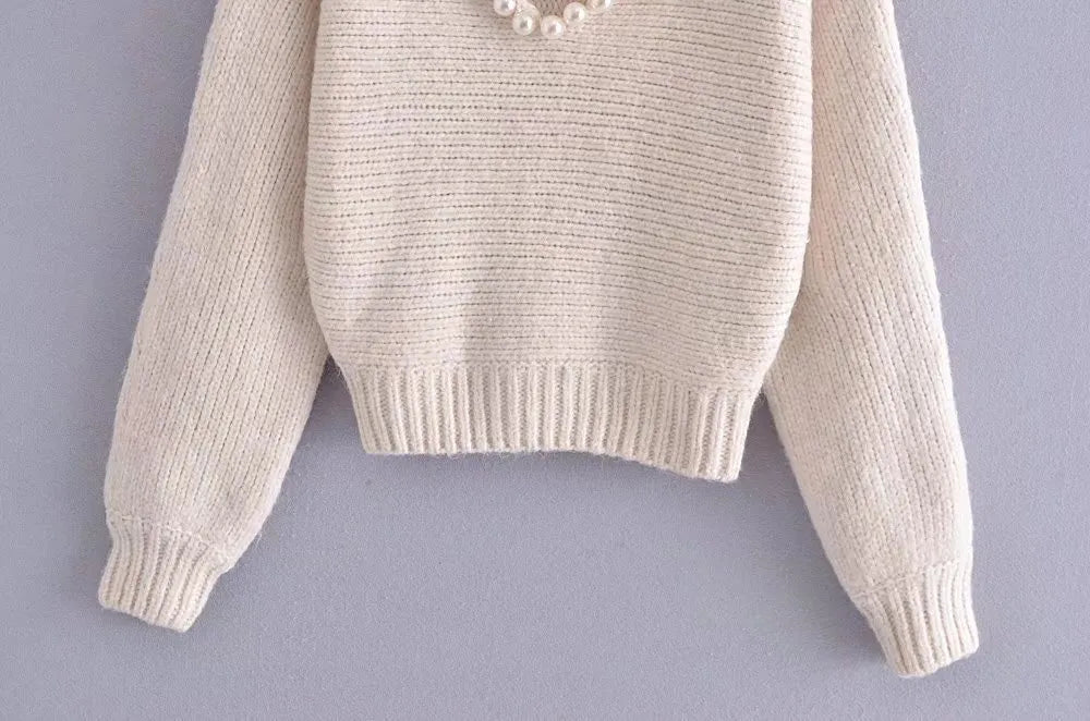 Angèle - Pull-over chic et décontracté à fausse perle