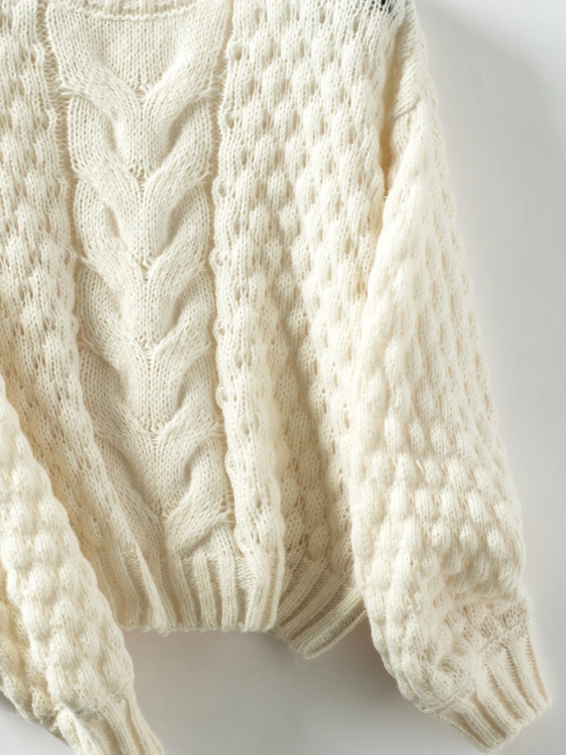 Elara - Pull à col rond et manches longues en maille torsadée pour femme